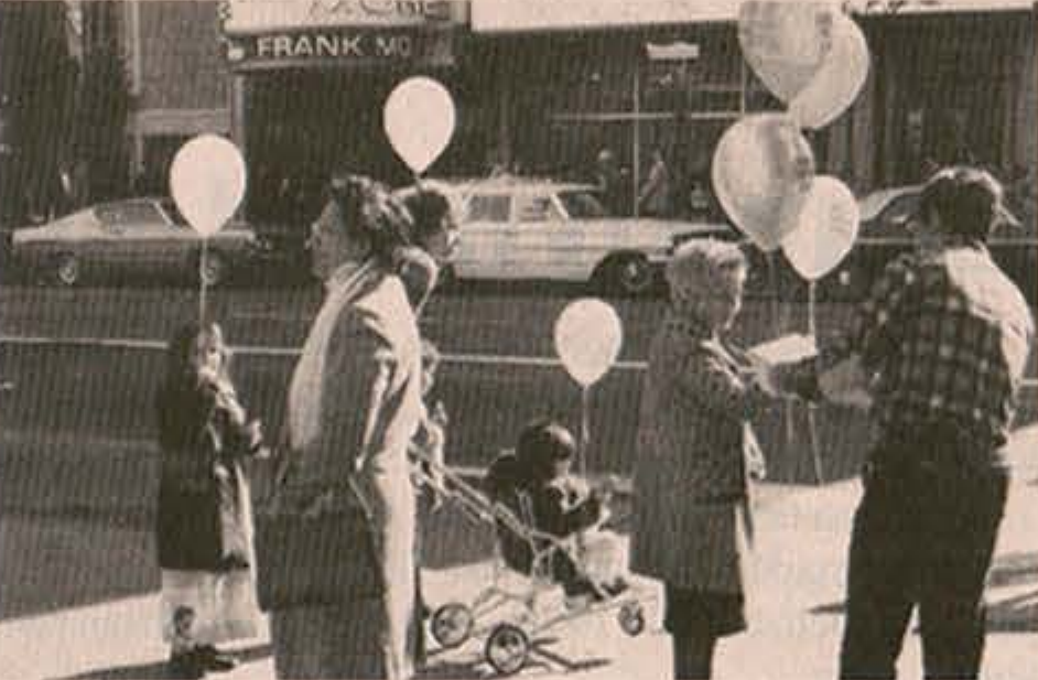 File:Balloons invitations and pamphlets given to passersby.png