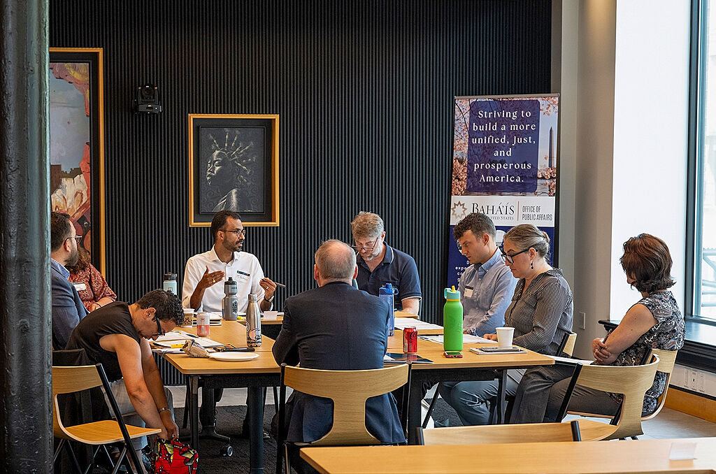 File:Symposium Participants Discussing Humanity Oneness-1.jpg