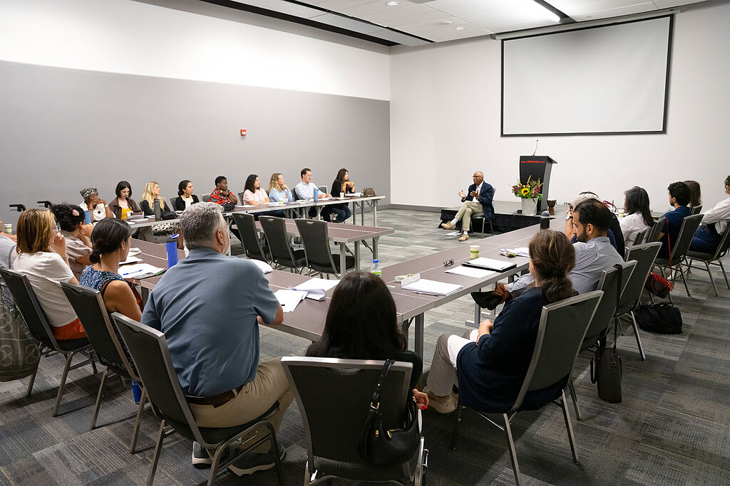 File:Participants engage in discussion during.jpg