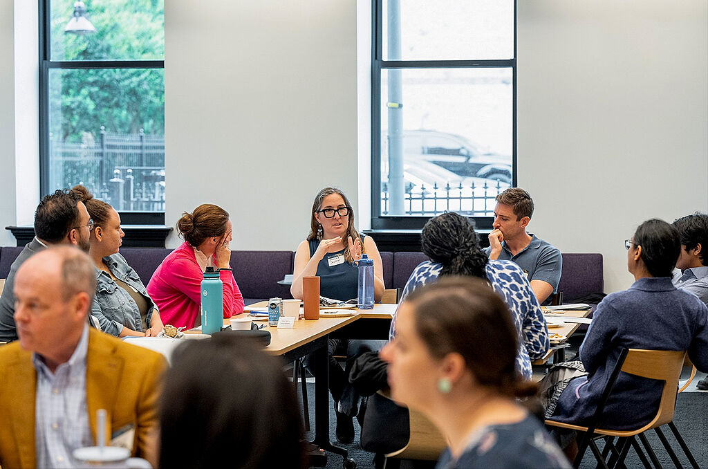 File:Symposium Participants Discussing Humanity Oneness-2.jpg