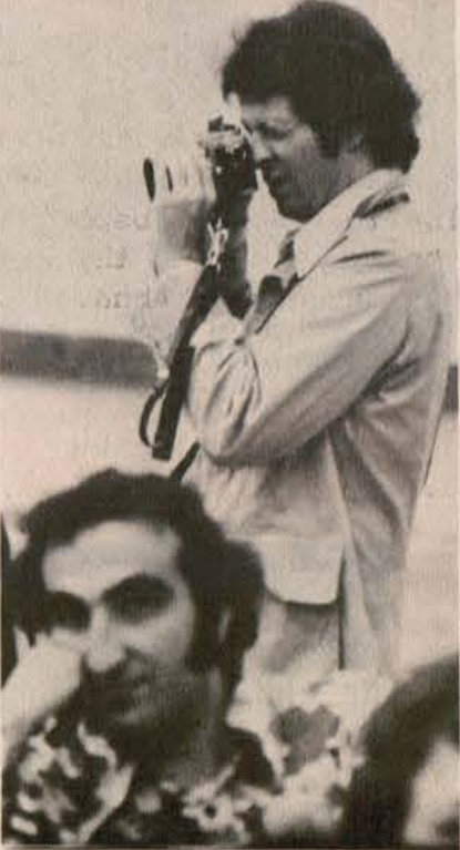 File:Man taking a photograph.png