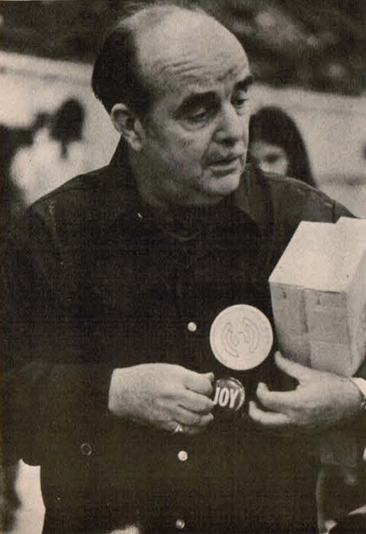 File:William Sears holding JOY badge.png
